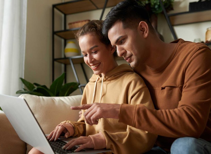 couple-using-laptop-together-at-home-2022-02-28-21-47-44-utc.jpg